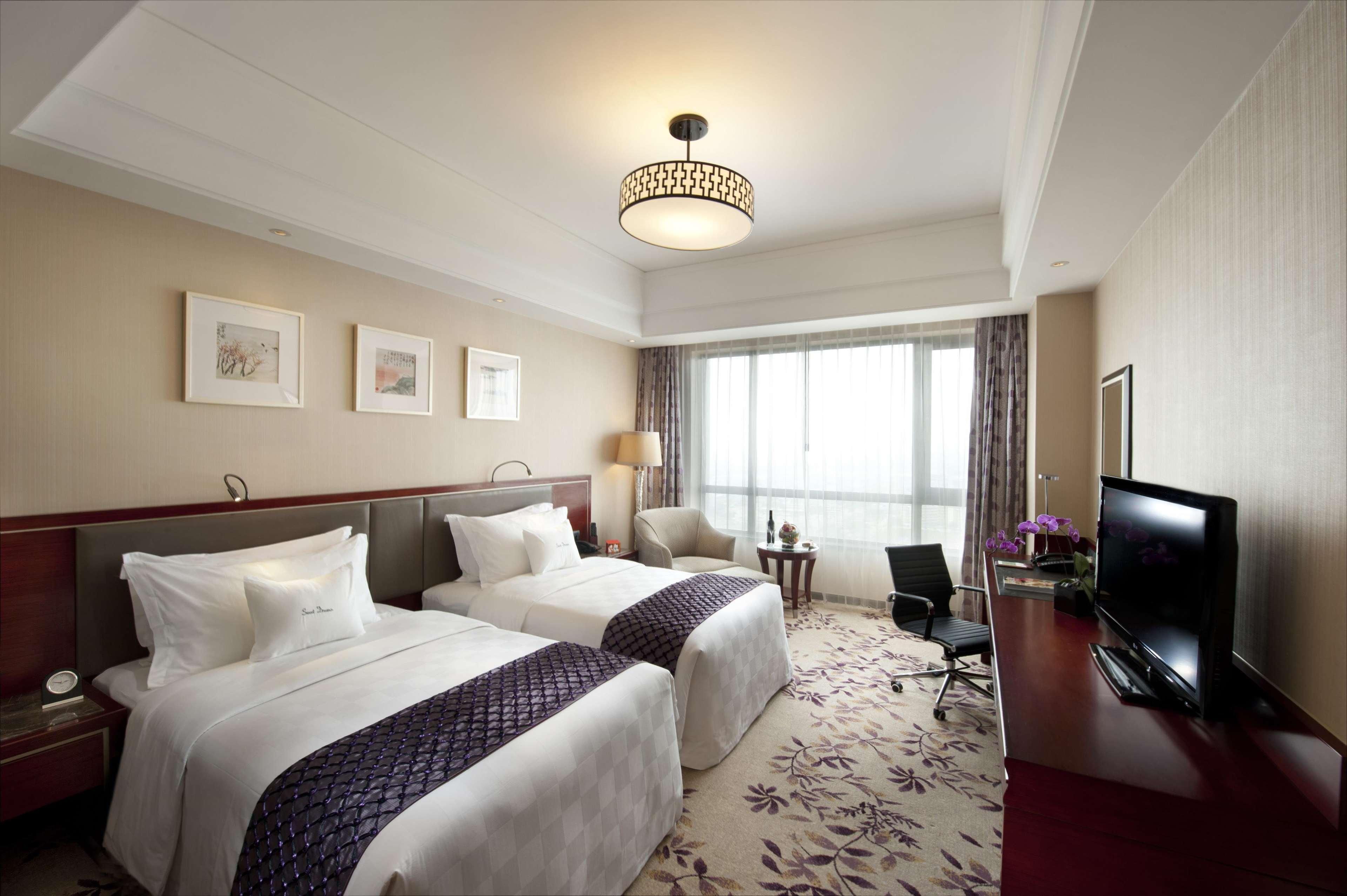 Отель Doubletree By Hilton Wuxi Уси Экстерьер фото