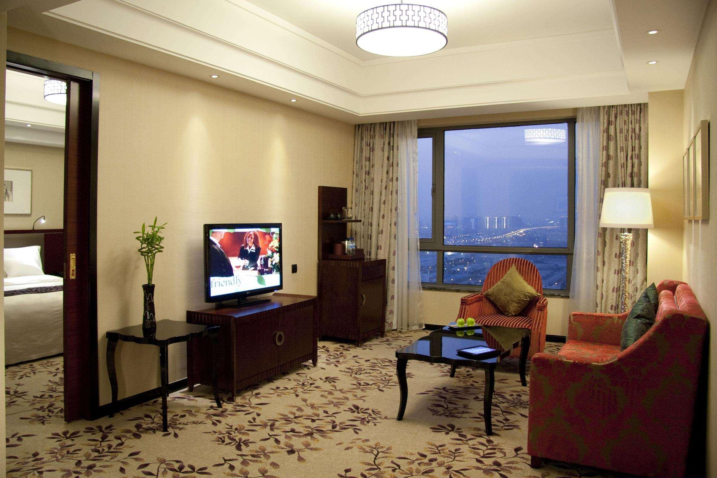 Отель Doubletree By Hilton Wuxi Уси Номер фото
