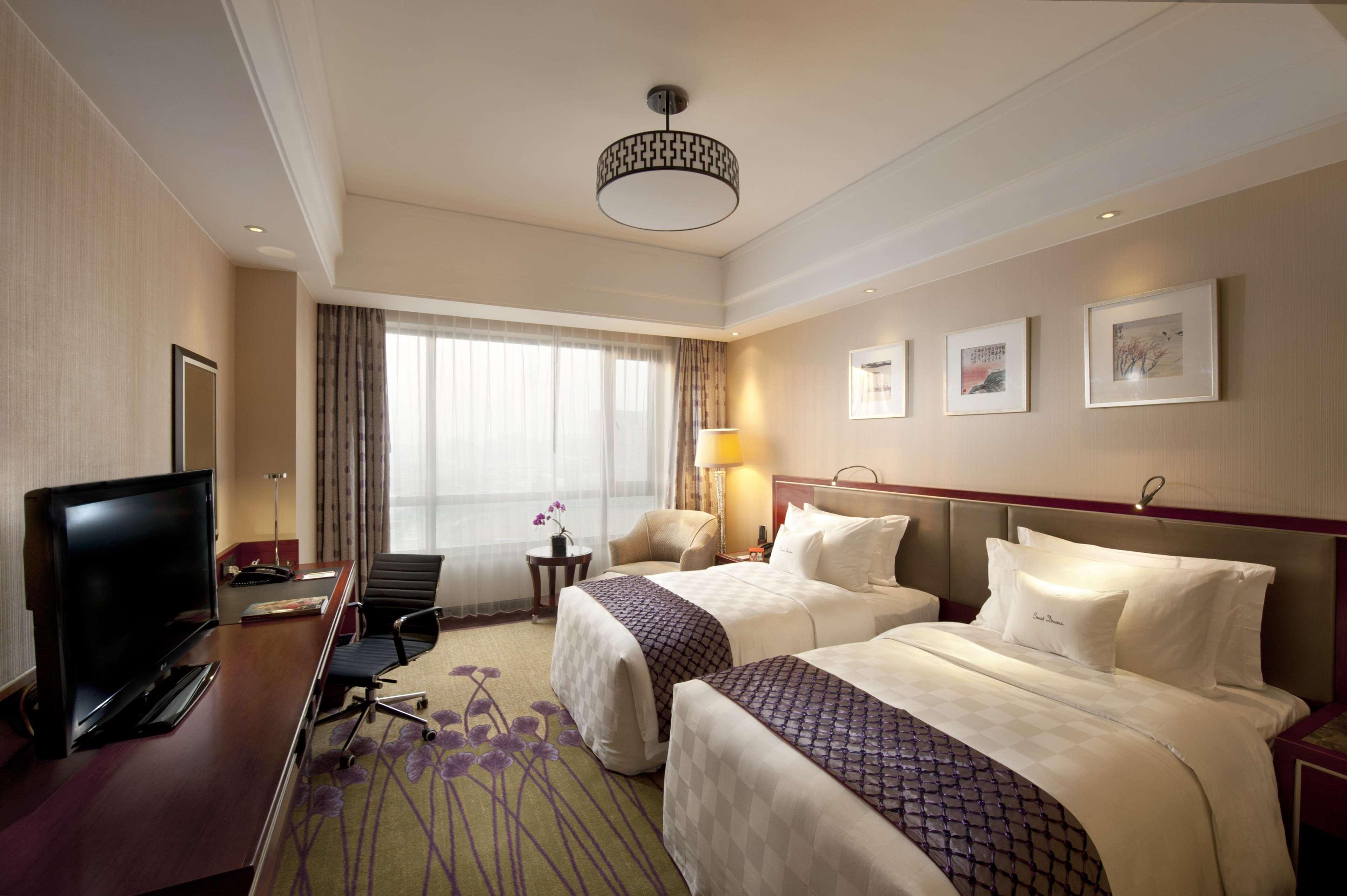 Отель Doubletree By Hilton Wuxi Уси Номер фото