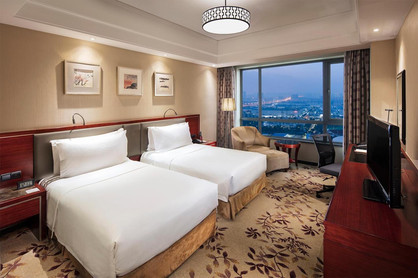 Отель Doubletree By Hilton Wuxi Уси Экстерьер фото