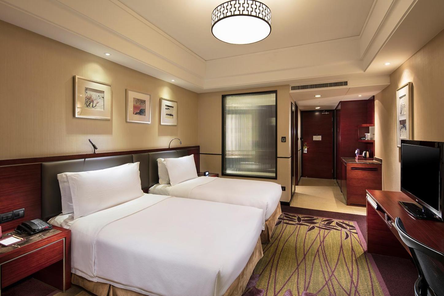 Отель Doubletree By Hilton Wuxi Уси Экстерьер фото
