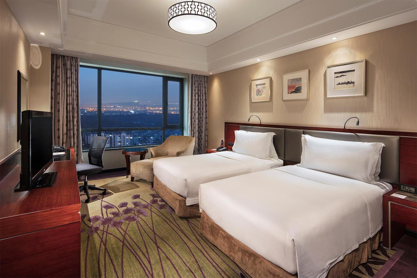 Отель Doubletree By Hilton Wuxi Уси Экстерьер фото
