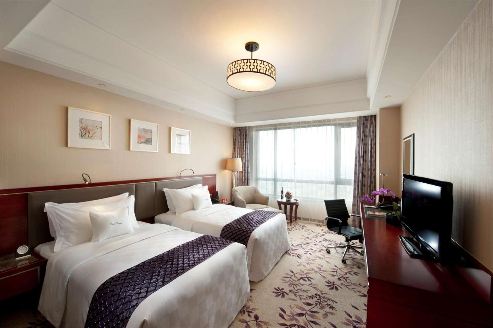 Отель Doubletree By Hilton Wuxi Уси Экстерьер фото