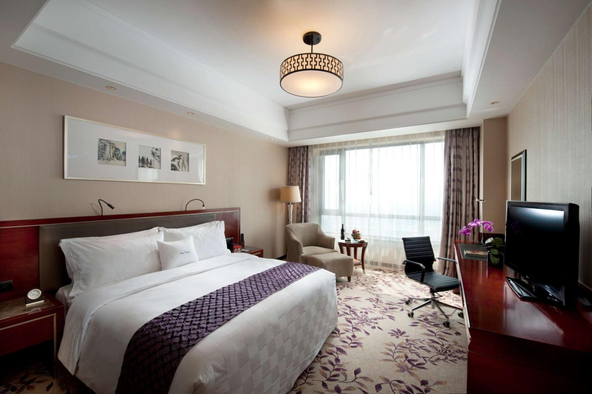 Отель Doubletree By Hilton Wuxi Уси Экстерьер фото