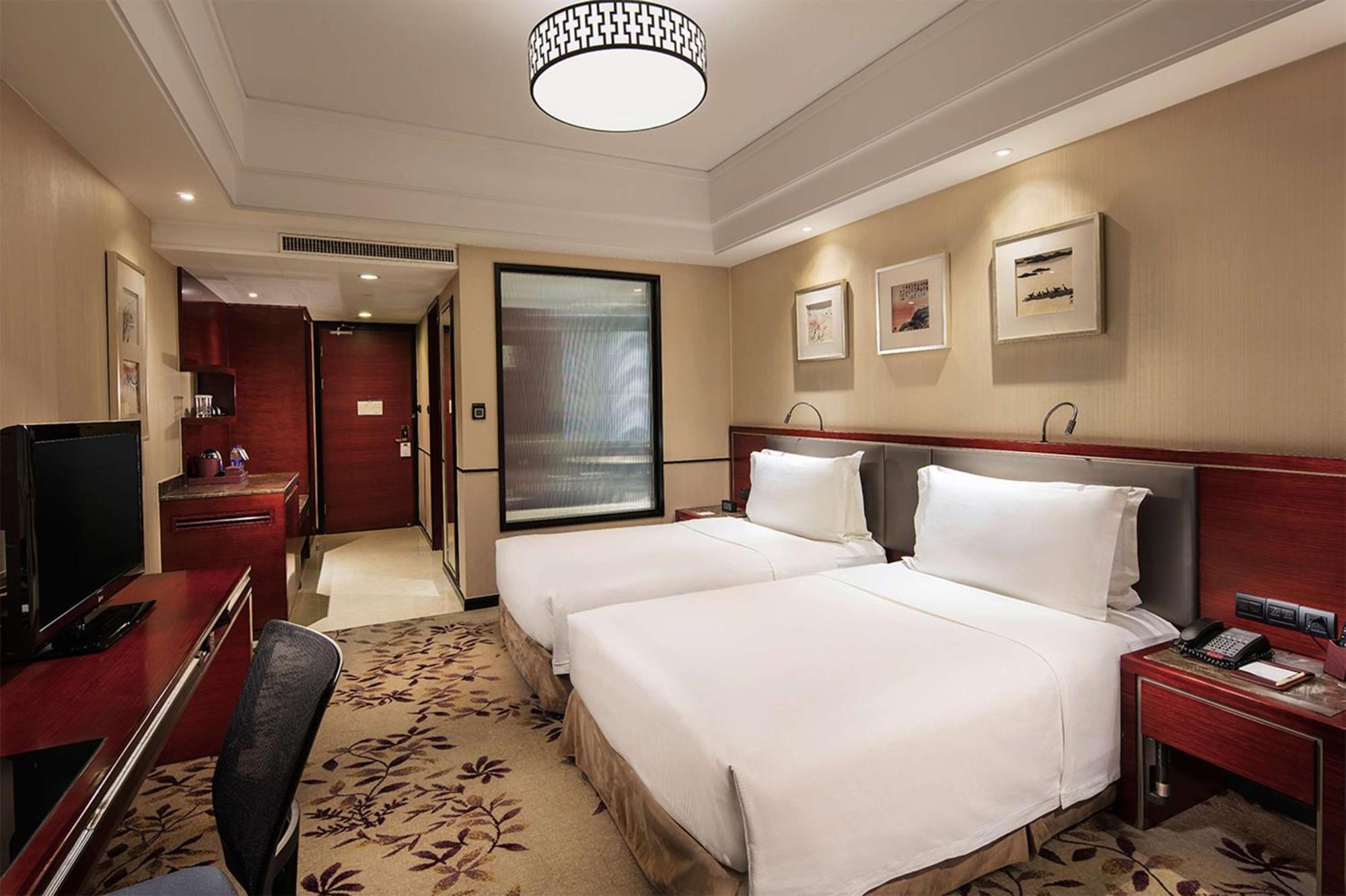 Отель Doubletree By Hilton Wuxi Уси Экстерьер фото