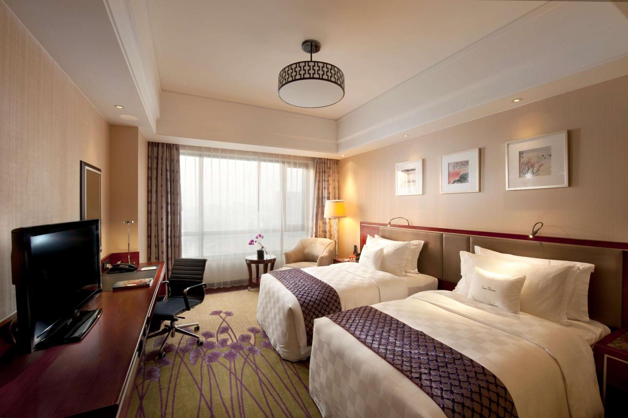 Отель Doubletree By Hilton Wuxi Уси Экстерьер фото